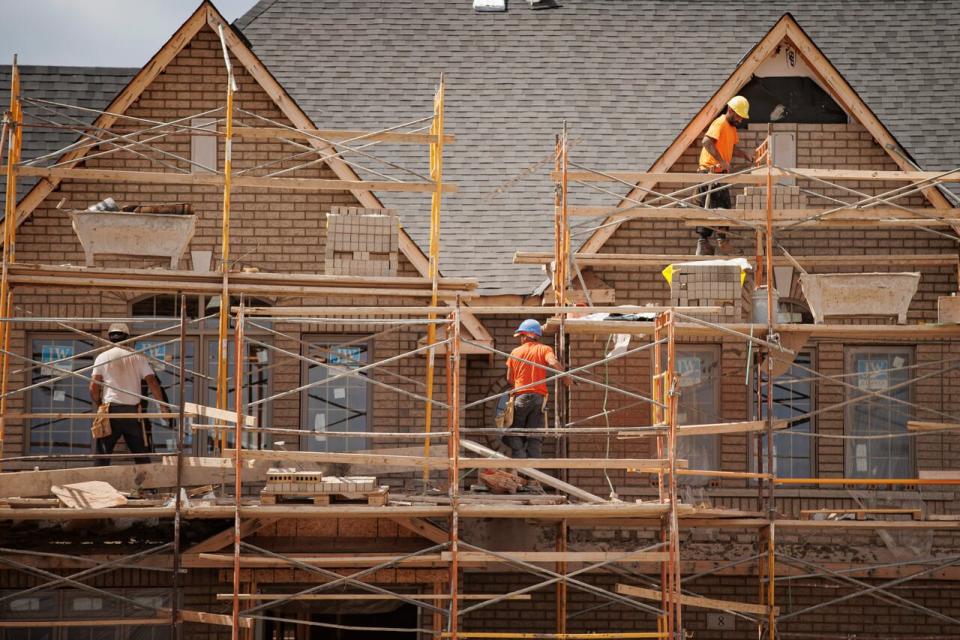 A new housing development is pictured in Brampton, Ont., on July 12, 2022. Post-pandemic interest rate hikes have reduced the buying power of people entering the housing market and increased the financial burden on existing homeowners paying off a mortgage.