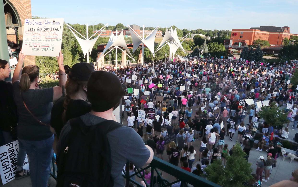 Hundreds gather Tuesday at the Rally for Reproductive Justice at the Cuyahoga Falls Pavilion and Amphitheater.