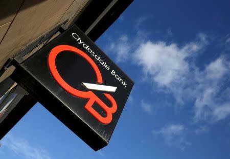 FILE PHOTO: A sign hangs outside a Clydesdale Bank in Edinburgh, Scotland, Britain February 3, 2016. REUTERS/Russell Cheyne//File Photo