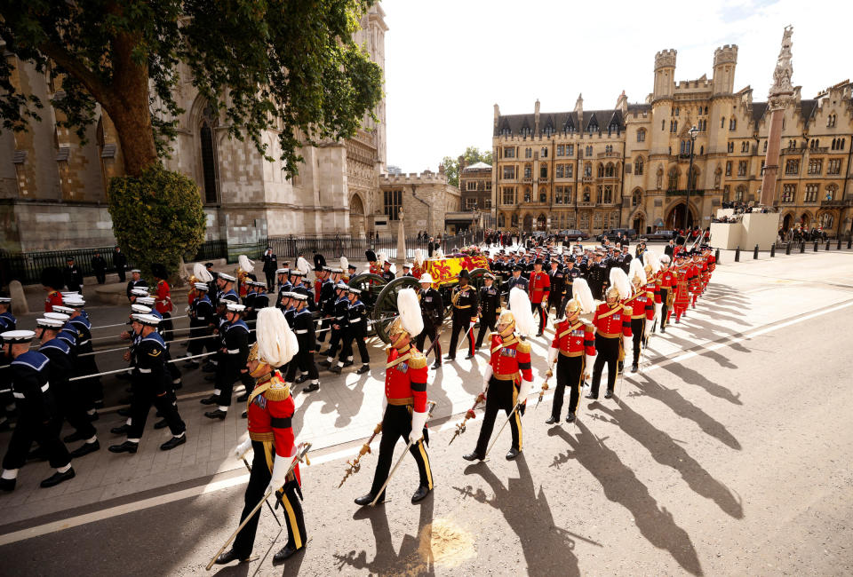 The coffin of Queen Elizabeth II makes its way from Westminster Abbey following the funeral service.<span class="copyright">John Sibley—Reuters</span>