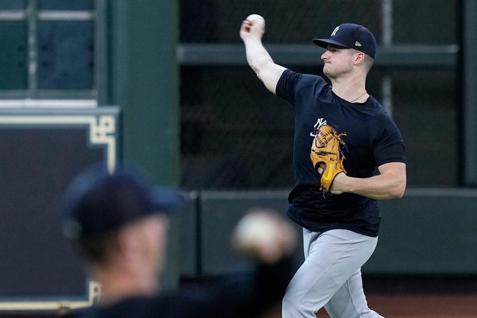 New York Yankees starting pitcher Clarke Schmidt works out before a baseball game against the Houston Astros, Saturday, Sept. 2, 2023, in Houston. (AP Photo/Kevin M. Cox)