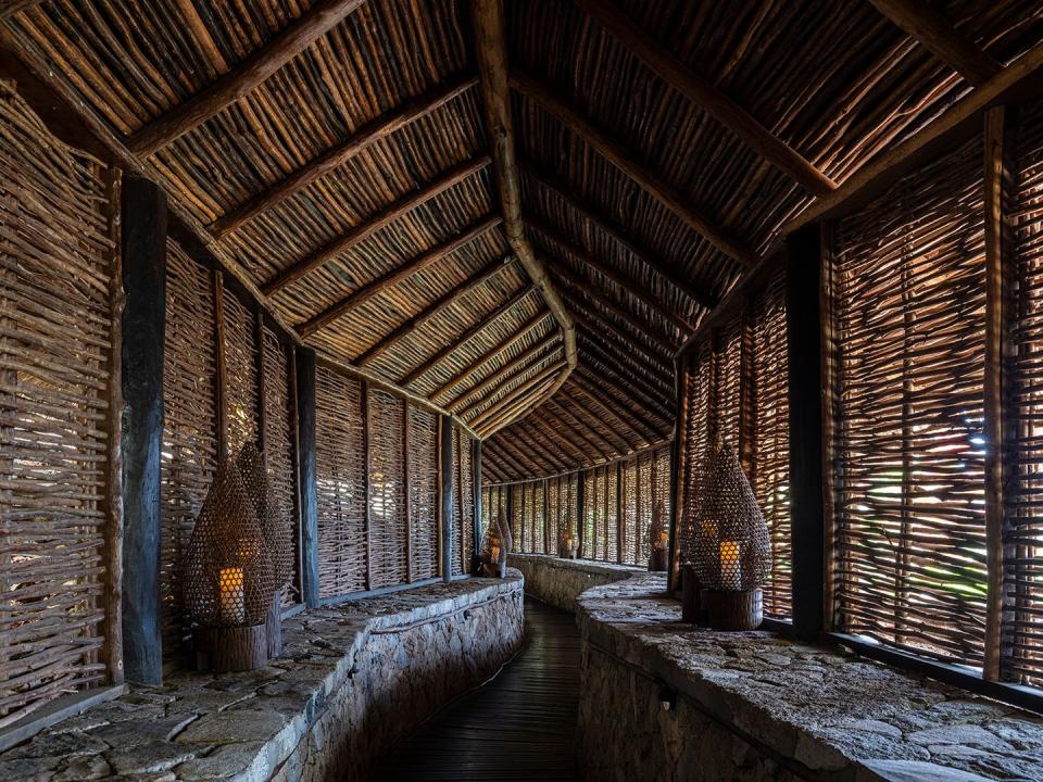 a stone building with a bench