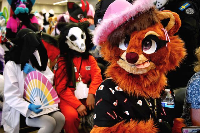 <p>AGNES BUN/AFP via Getty</p> Furries attend Anthrocon 2023