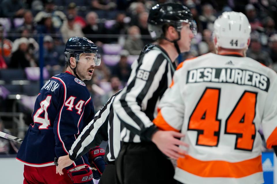 Nov 15, 2022; Columbus, Ohio, USA;  After receiving an interference penalty, Columbus Blue Jackets defenseman Erik Gudbranson (44) has words with Philadelphia Flyers left wing Nicolas Deslauriers (44) during the second period of the NHL hockey game at Nationwide Arena. Mandatory Credit: Adam Cairns-The Columbus Dispatch