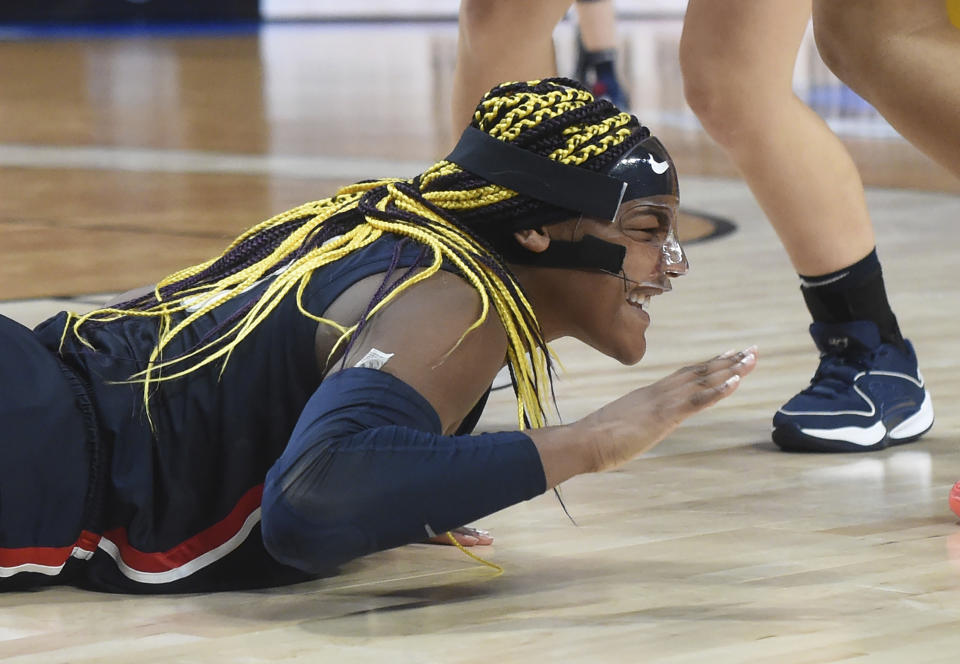 UConn forward Aaliyah Edwards reacts after being fouled during the second half of an Elite Eight college basketball game against Southern California in the women's NCAA Tournament, Monday, April 1, 2024, in Portland, Ore. (AP Photo/Steve Dykes)