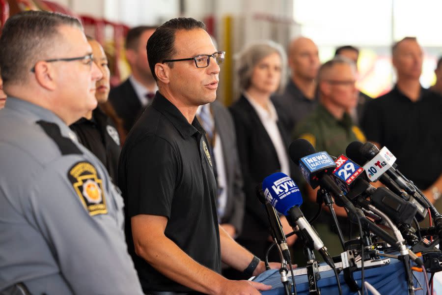 Pennsylvania Governor Josh Shapiro (C) speaks to the media at a press conference held at the Po-Mar-Lin Fire Company after the capture of escaped convict Danelo Cavalcante in Unionville, Pennsylvania, on 13 September, 2023. US police announced the capture of a convicted Brazilian murderer who caught national attention with his daring prison escape and two weeks on the run. (Photo by RYAN COLLERD / AFP) (Photo by RYAN COLLERD/AFP via Getty Images)