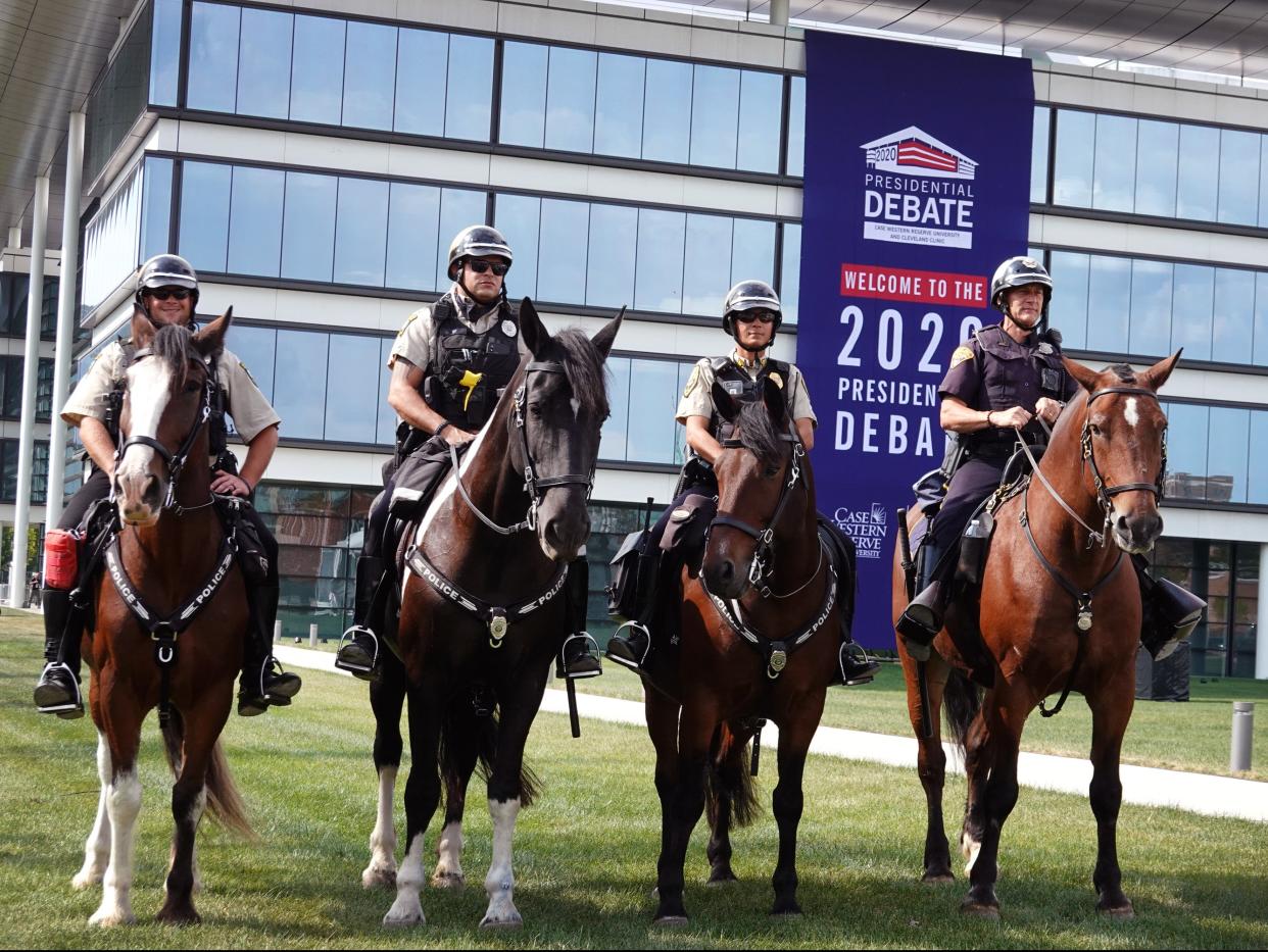 Mounted police patrol around the Samson Pavilion at Case Western Reserve University ahead of the presidential debate (Getty Images)