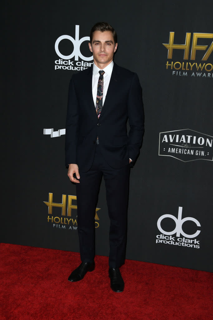 <p>The younger Franco paired a printed tie with an all black suit. (Photo: Getty Images) </p>