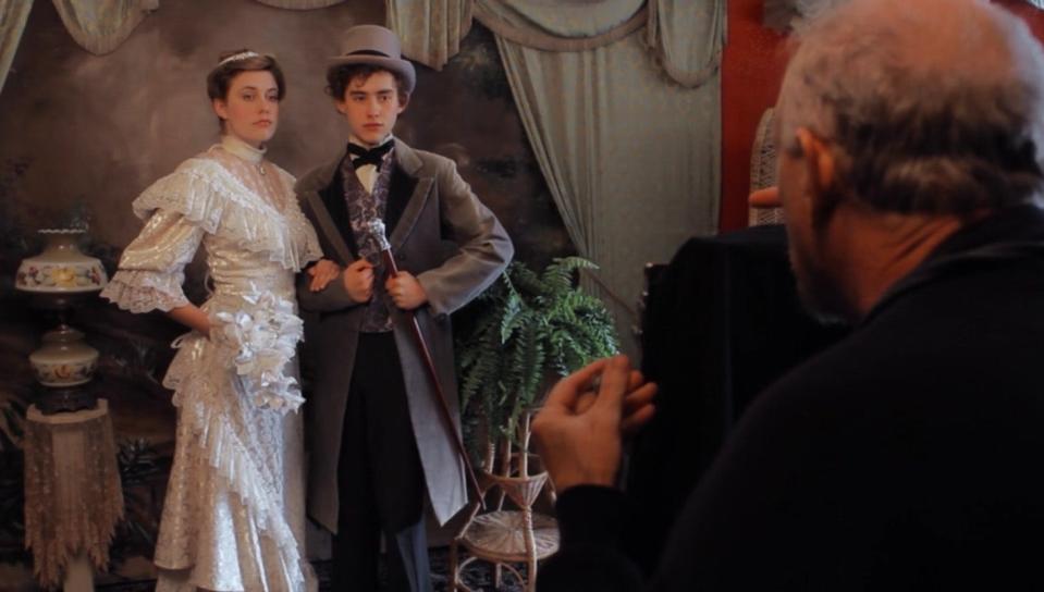 Jim Miller, owner of Yesteryear's Old Time Photography in Rehoboth Beach, takes a photo of Greta Gerwig and Olly Alexander in the 2011 film "The Dish & the Spoon."