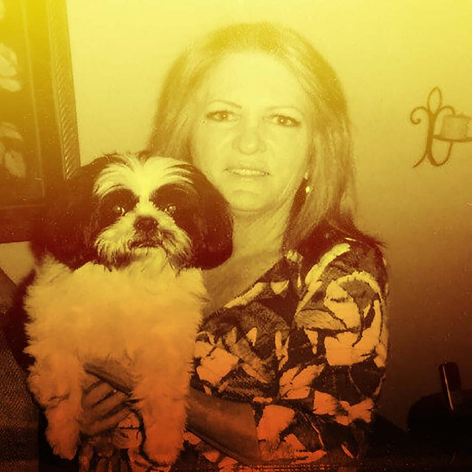 Peggy Frank, seen here in a family photo with her dog Snookie, passed out in her mail truck on a day in which the local high hit 117 degrees. (Photo: Courtesy Lynn Calkins)