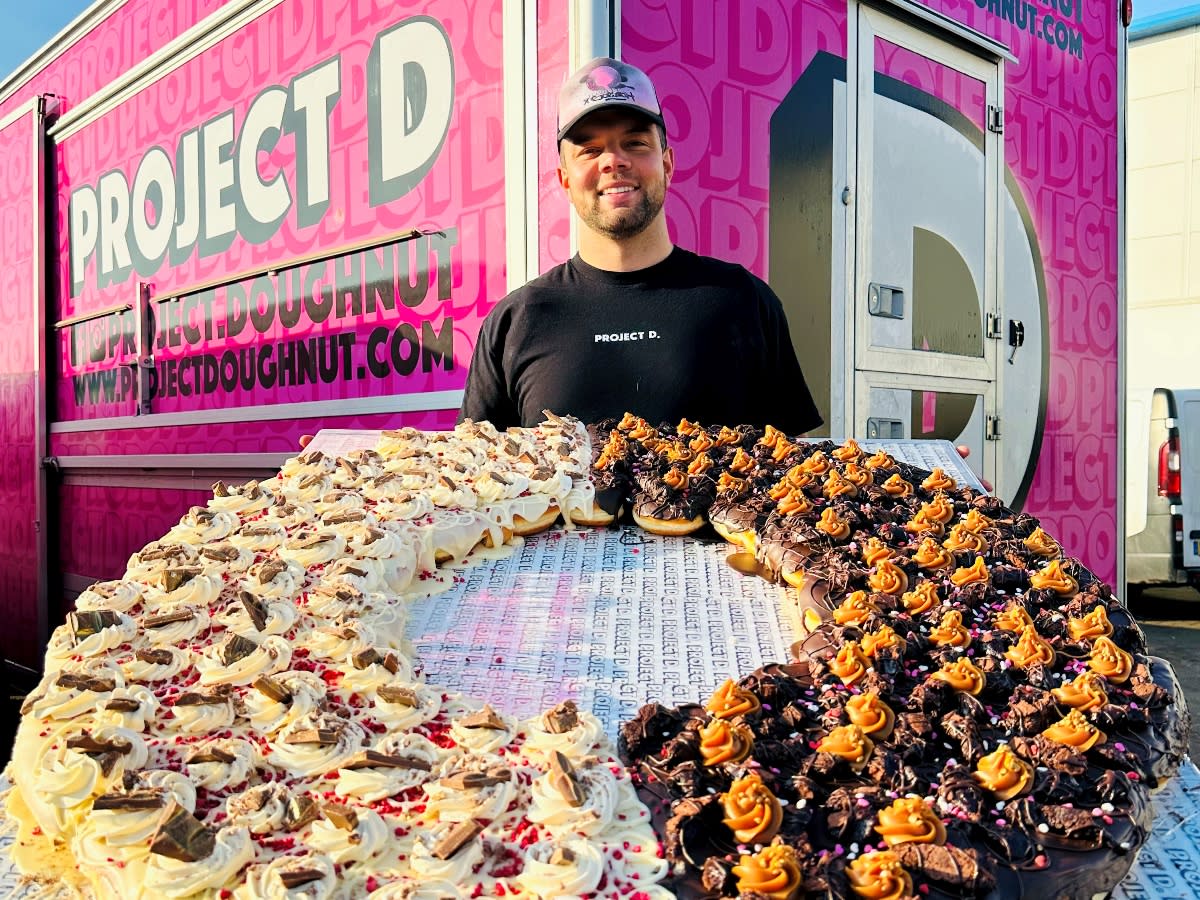 Derbyshire-based bakery Project D has created a massive doughnut which weighs 40kg and is packed with 170,000 calories. (SWNS)