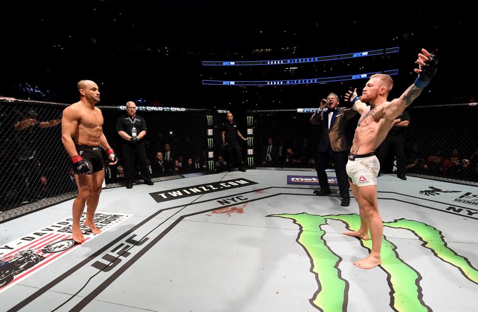 <p>Eddie Alvarez of the United States (left) prepares for his fight against Conor McGregor of Ireland in their lightweight championship bout during the UFC 205 event at Madison Square Garden on November 12, 2016 in New York City. (Photo by Jeff Bottari/Zuffa LLC/Zuffa LLC via Getty Images) </p>
