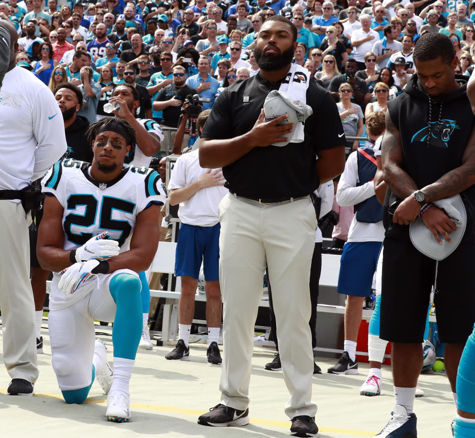 Carolina Panthers' Eric Reid (25) kneels during the national anthem before an NFL football game against the New York Giants in Charlotte, N.C., Sunday, Oct. 7, 2018. (AP Photo/Jason E. Miczek)