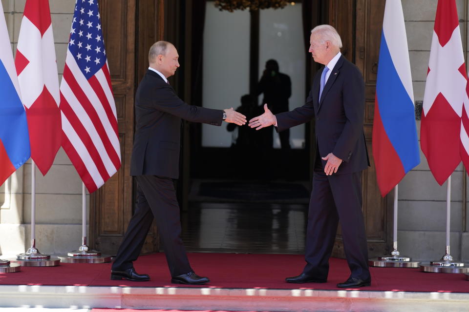 FILE - President Joe Biden and Russian President Vladimir Putin, arrive to meet at the 'Villa la Grange', June 16, 2021, in Geneva, Switzerland. Putin was among the top gift givers to Biden and his family in 2021, according to federal documents published on Thursday, Feb. 23, 2023. Putin gave Biden a $12,000 laquer writing box and pen when they met at a highly anticipated summit in Geneva, Switzerland in June 2021. (AP Photo/Patrick Semansky, File)