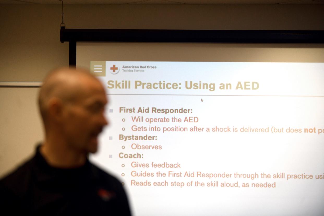 Randy Feesler, owner of The Pulse Provider, instructs a class in lifesaving skills at the American Red Cross offices in Canton.