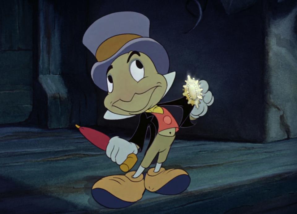 Jiminy Cricket with a badge in Pinocchio