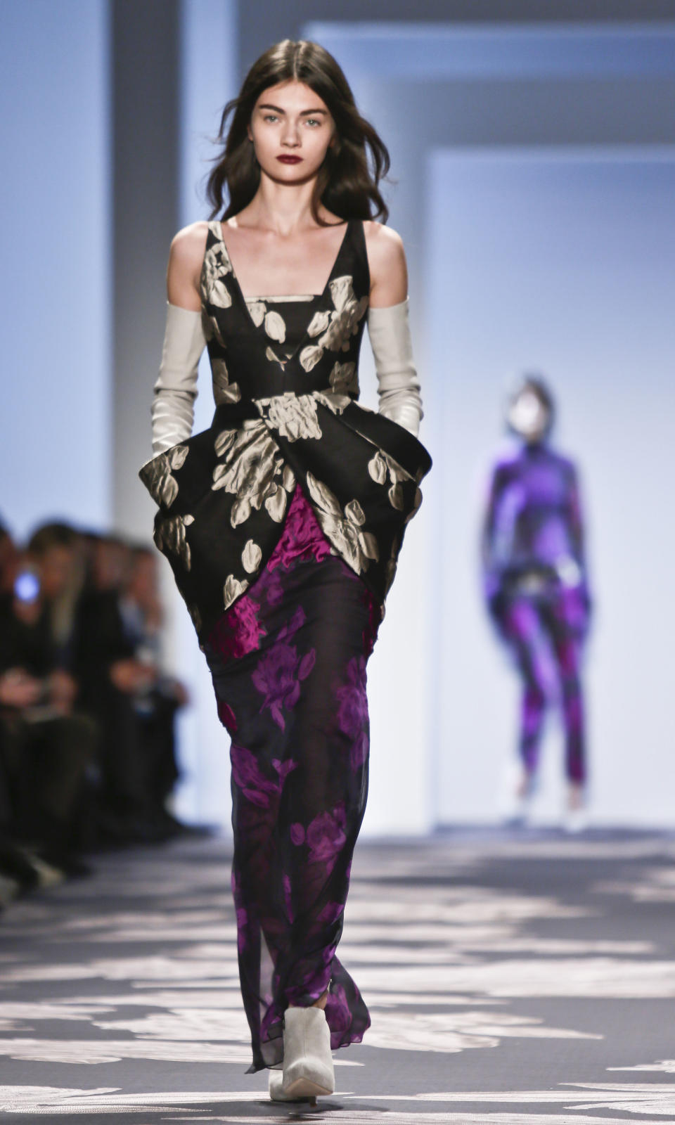 Fashion from the Vera Wang Fall 2013 collection is modeled on Tuesday, Feb. 12, 2013 in New York. (AP Photo/Bebeto Matthews)