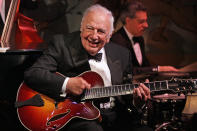 <p>Bucky Pizzarelli, famed jazz guitarist and former member of the <a href="https://people.com/tag/the-tonight-show/" rel="nofollow noopener" target="_blank" data-ylk="slk:Tonight Show;elm:context_link;itc:0;sec:content-canvas" class="link "><em>Tonight Show</em></a> orchestra, <a href="https://people.com/music/bucky-pizzarelli-dead-coronavirus-jazz-guitarist/" rel="nofollow noopener" target="_blank" data-ylk="slk:died on April 1;elm:context_link;itc:0;sec:content-canvas" class="link ">died on April 1</a> after testing positive for the <a href="https://people.com/tag/lost-to-COVID-19/" rel="nofollow noopener" target="_blank" data-ylk="slk:novel coronavirus (COVID-19);elm:context_link;itc:0;sec:content-canvas" class="link ">novel coronavirus (COVID-19)</a>. He was 94.</p> <p>His son, John Pizzarelli - also a jazz artist who toured and performed alongside his father - <a href="https://www.instagram.com/p/B-e7K8vgGQj/" rel="nofollow noopener" target="_blank" data-ylk="slk:confirmed the news on Instagram;elm:context_link;itc:0;sec:content-canvas" class="link ">confirmed the news on Instagram</a>, highlighting Bucky's career highlights. John called Bucky a "wonderful dad."</p> <p>"My father was a mentor to so many guitarists both professional and amateur," wrote John. "Always doling out advice, always encouraging, always in tune and always ready for a record date."</p> <p>Bucky is also survived by his wife Ruth, daughters Anne Hymes and Mary Pizzarelli, another son, bassist Martin Pizzarelli, and four grandchildren, according to <a href="https://www.nytimes.com/2020/04/02/arts/music/bucky-pizzarelli-dead-coronavirus.html" rel="nofollow noopener" target="_blank" data-ylk="slk:The New York Times;elm:context_link;itc:0;sec:content-canvas" class="link "><em>The New York Times</em></a>.</p>