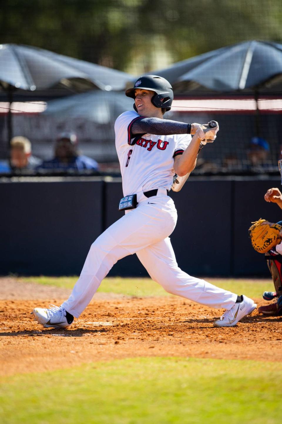 MIAMI SHORES, FL - Barry University infielder/right-handed pitcher Jake Ogden (16) as Barry University Men’s Baseball plays in their home opener against Lane College at Feinbloom Field on Friday, February 3, 2023 in Miami Shores, FL. (Photo by Kelly Gavin/Barry University)