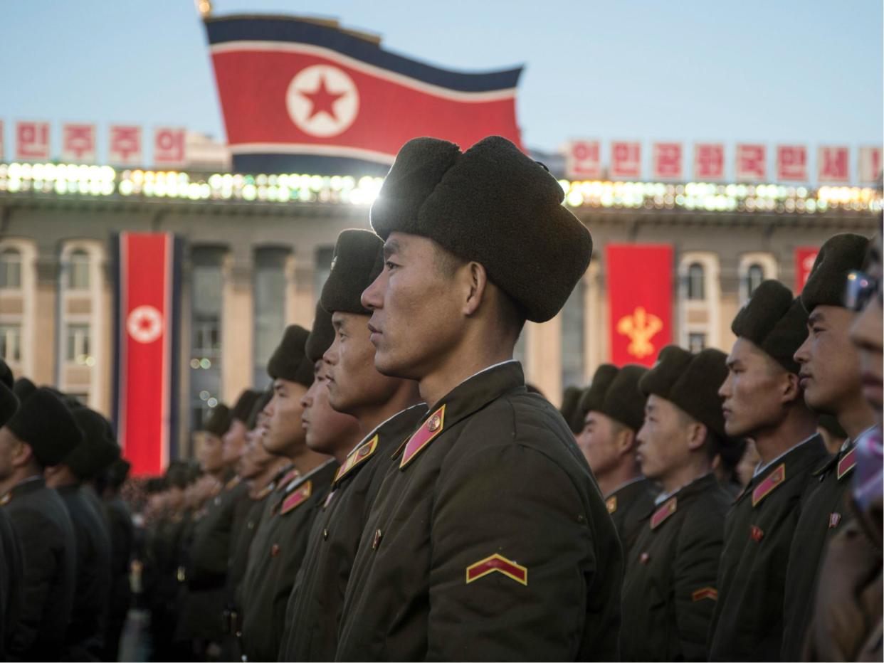 North Korean soldiers attend a mass rally to celebrate the North's declaration on 29 November it had achieved full nuclear statehood: Getty
