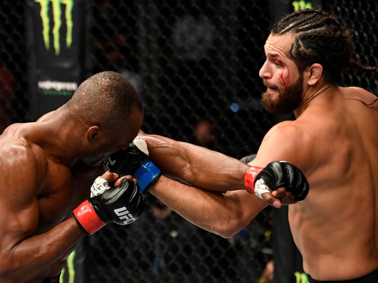 Kamaru Usman (left) again defends his welterweight title against Jorge Masvidal (Zuffa LLC via Getty Images)