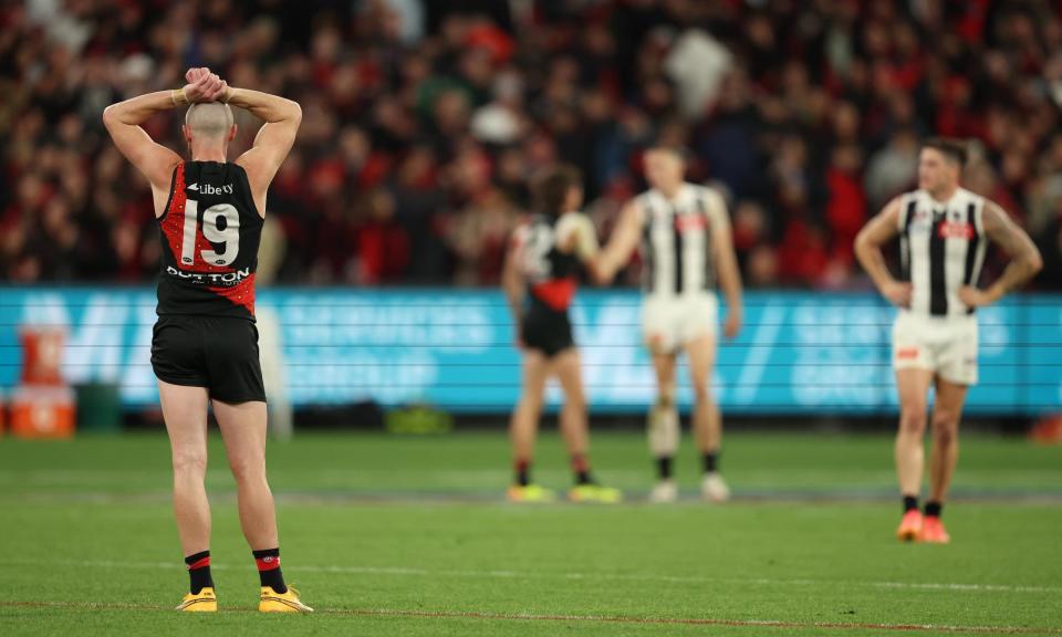 <span>Two critical errors from the Essendon substitute Nick Hind gave Collingwood the reprieve they needed, but it wasn’t enough to secure an Anzac Day victory.</span><span>Photograph: Robert Cianflone/Getty Images</span>