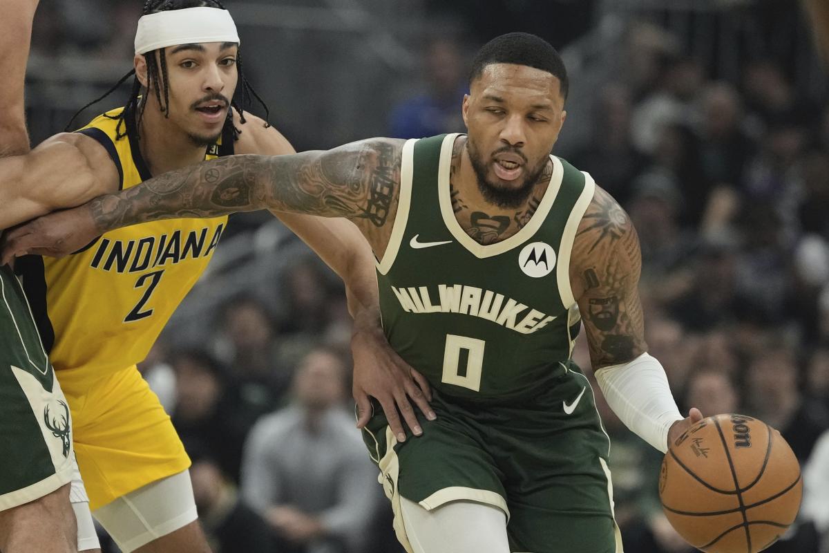 Damian Lillard 35 - point 1st half helps Bucks beat Pacers 109 - 94 without Giannis in playoff opener