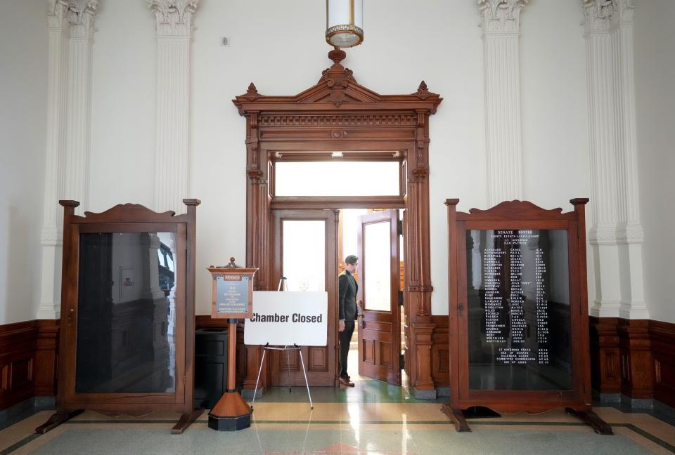 Assistant Sergeant-at-Arms Lewis Bowden guards the door to the Senate Chamber which was closed for the set up of the impeachment trial of Attorney General Ken Paxton on Tuesday August 29, 2023.