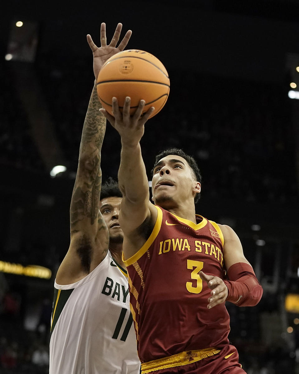 Iowa State guard Tamin Lipsey (3) shoots under pressure from Baylor forward Jalen Bridges (11) during the first half of an NCAA college basketball game in the second round of the Big 12 Conference tournament Thursday, March 9, 2023, in Kansas City, Mo. (AP Photo/Charlie Riedel)