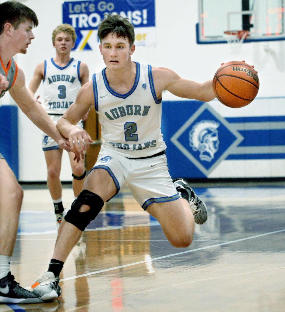 Auburn's Sawyer Smith drives toward the basket during the game against South County Friday, January 5, 2024.