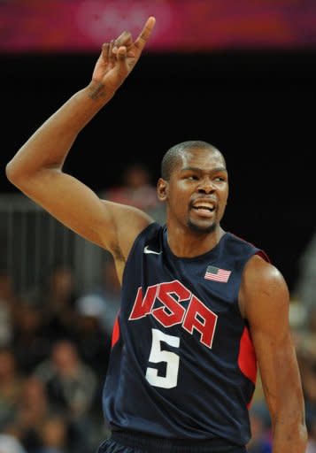 US forward Kevin Durant reacts during the men's basketball preliminary round match Argentina vs USA as part of the London 2012 Olympic Games at the Basketball Arena in London. USA defeated Argentina 126-97