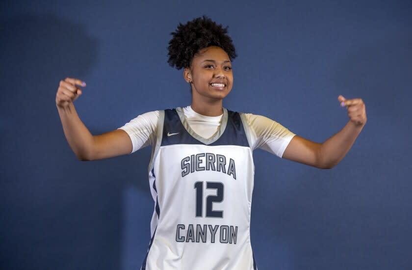 CHATSWORTH, CA - OCTOBER 27, 2021: JuJu Watkins, a member of the Sierra High School girls basketball team, poses for a photographer during media day inside the school's gymnasium. (Mel Melcon / Los Angeles Times)