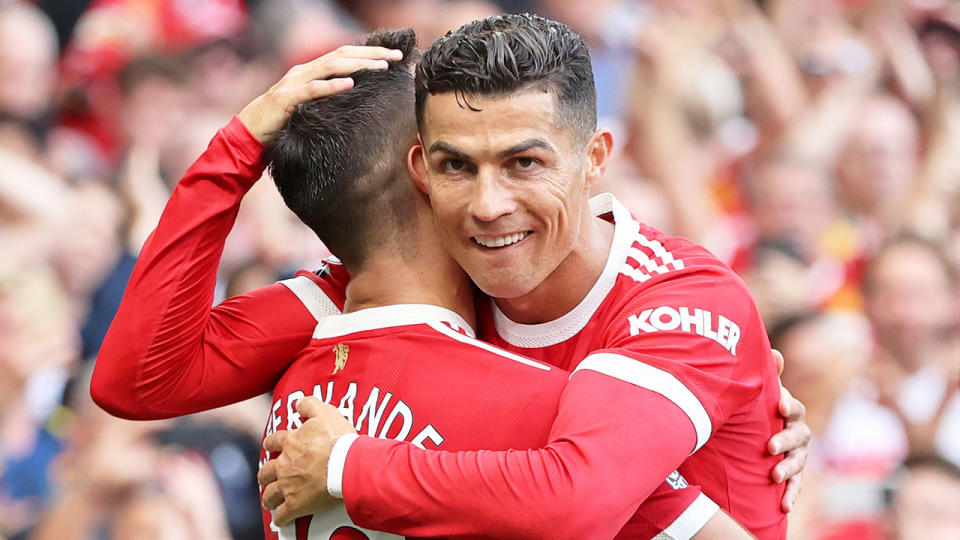 Pictured here, Cristiano Ronaldo hugs a teammates after making his return to Manchester United.