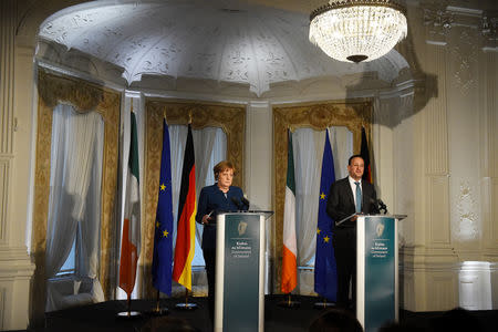 Irish Prime Minister Leo Varadkar and German Chancellor Angela Merkel attend a news conference during Merkel's visit to Dublin, where the latest Brexit developments were on the agenda, in Farmleigh House, Dublin, Ireland April 4, 2019. REUTERS/Clodagh Kilcoyne