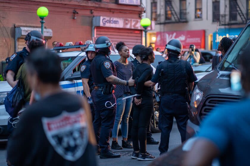 NEW YORK, NY - JUNE 04: NYPD arrest protesters for breaking the citywide 8:00PM curfew on June 4, 2020 in the Bronx borough of New York City. Widespread protests continue around the country and other parts of the world over the death of George Floyd while in Minneapolis, Minnesota police custody on May 25. (Photo by David Dee Delgado/Getty Images)