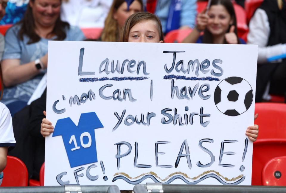 A fan appeals for James’s top during a Chelsea game (Paul Childs / Action Images via Reuters)