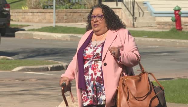 Complainant Stephanie Douglas arrives at the P.E.I. Supreme Court Tuesday to testify at the trial of the man she accuses of sexually assaulting her in January 2014. (Brian Higgins/CBC - image credit)