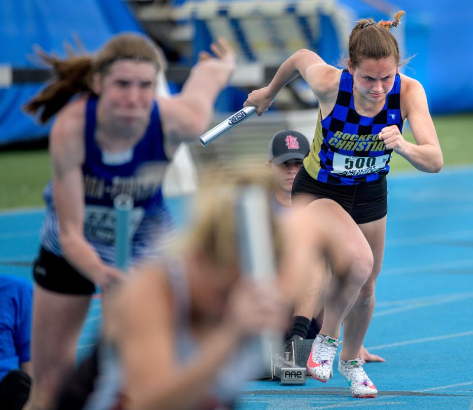 Rockford Christian's Mandy Nelson sprints out of the blocks as the first leg of the 4X100-meter relay during the Class 1A State Track and Field Championships at Eastern Illinois University. Rockford Christian took fourth in the event.