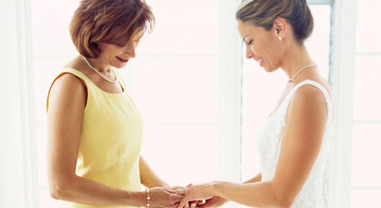 Mother of Bride supports her daughter on the big day [Photo: Getty]