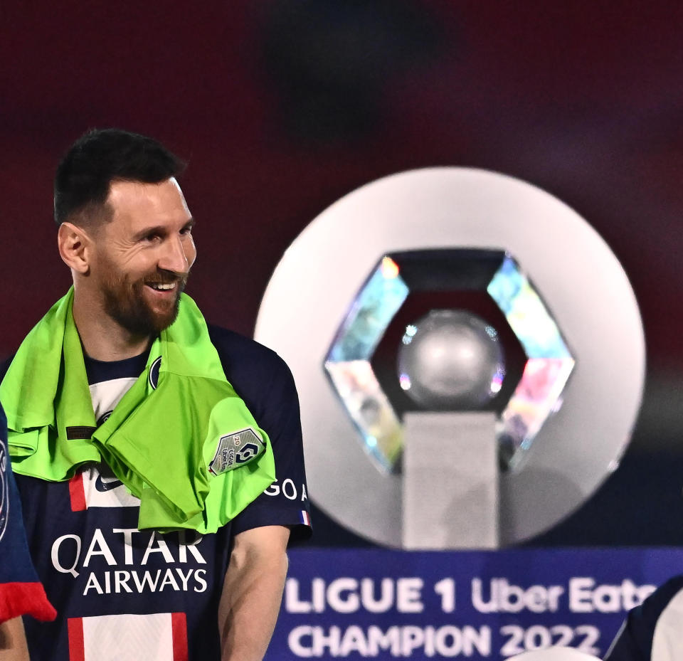 PARIS, FRANCE - JUNE 3: Lionel Messi Paris Saint-Germain celebrates with the Ligue 1 trophy after the Ligue 1 match between Paris Saint-Germain and Clermont Foot at Parc des Princes on June 3, 2023 in Paris, France.  (Photo by Sebastian Frej/MB Media/Getty Images)