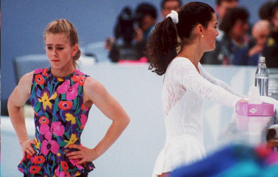 Tonya Harding (L) and Nancy Kerrigan (R) at an event one month after the infamous attack on Kerrigan. (Getty)