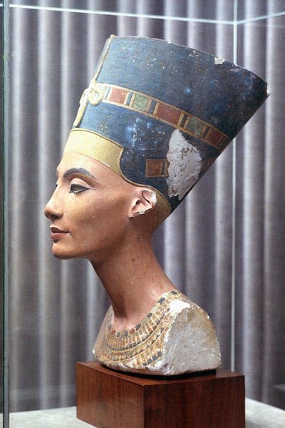 The famed and fought-over bust of Queen Nefertiti. <a href="https://www.gettyimages.com/detail/news-photo/side-view-of-limestone-bust-of-queen-nefertiti-circa-1340-news-photo/635751065?adppopup=true" rel="nofollow noopener" target="_blank" data-ylk="slk:Francis G. Mayer/Corbis/VCG via Getty Images;elm:context_link;itc:0;sec:content-canvas" class="link ">Francis G. Mayer/Corbis/VCG via Getty Images</a>