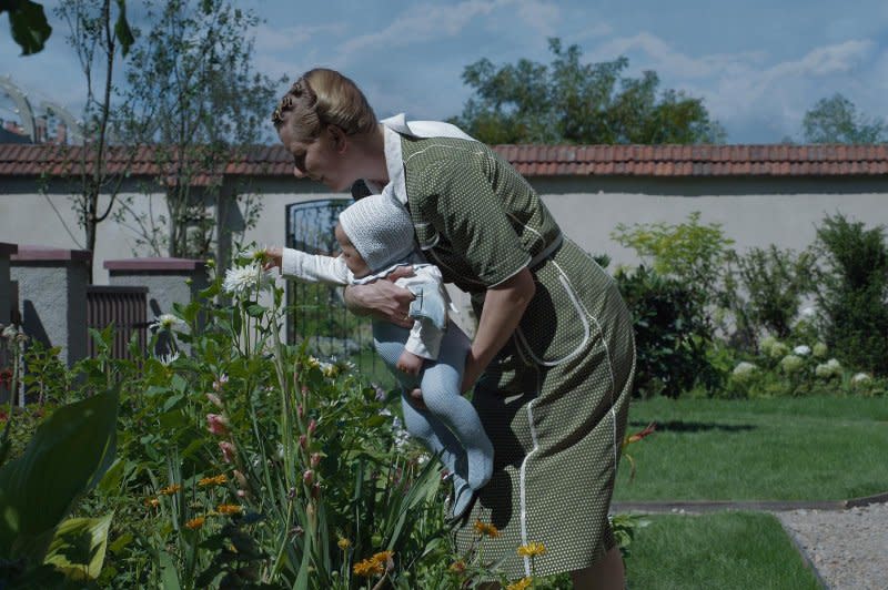 Hedwig (Sandra Hüller) tends to her garden while prisoners are held in Auschwitz next door. Photo courtesy of A24