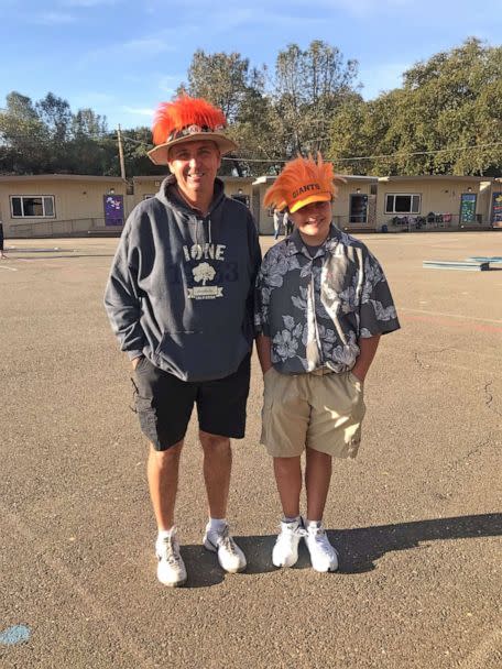 PHOTO: Huss with one of his students, Aubrey, who dressed up like him for Halloween.  (Mike Huss)