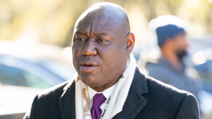 Attorney Ben Crump walks outside the Glynn County Courthouse last month as the jury deliberates in the trial of the killers of Ahmaud Arbery in Brunswick, Georgia. (Photo: Sean Rayford/Getty Images)