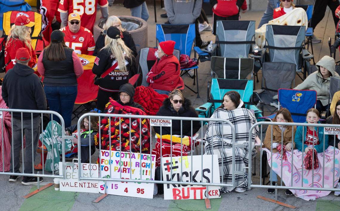 Chiefs fans gather along Grand Boulevard hours before the start of the Super Bowl parade on Wednesday. Travis Heying/The Wichita Eagle