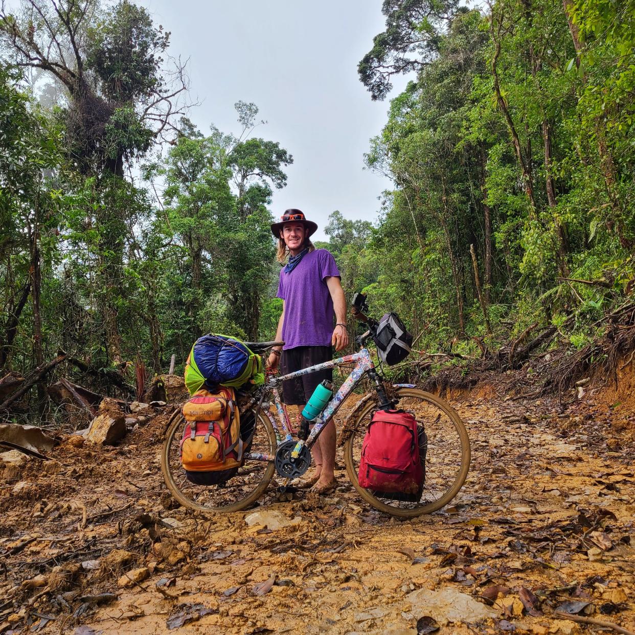 Daniel James of Canton on one of the undeveloped roads he encountered in Central America during his recent solo cycling trip, an adventure he undertook barefoot.