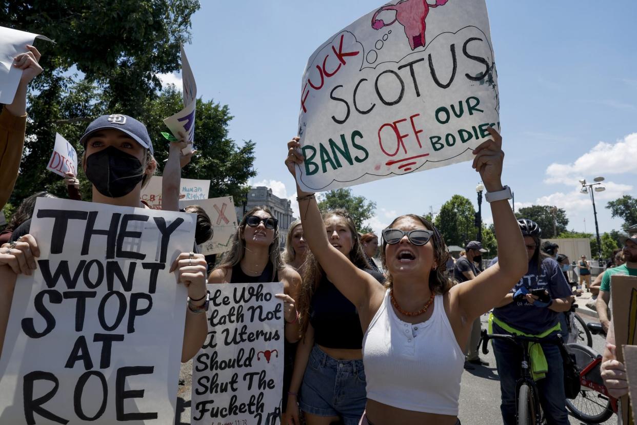 WASHINGTON, DC - JUNE 25: Abortion rights activists yell during a protest in the wake of the decision overturning Roe v. Wade outside the U.S. Supreme Court Building on June 25, 2022 in Washington, DC. The Supreme Court's decision in Dobbs v Jackson Women's Health overturned the landmark 50-year-old Roe v Wade case and erased a federal right to an abortion. (Photo by Anna Moneymaker/Getty Images)