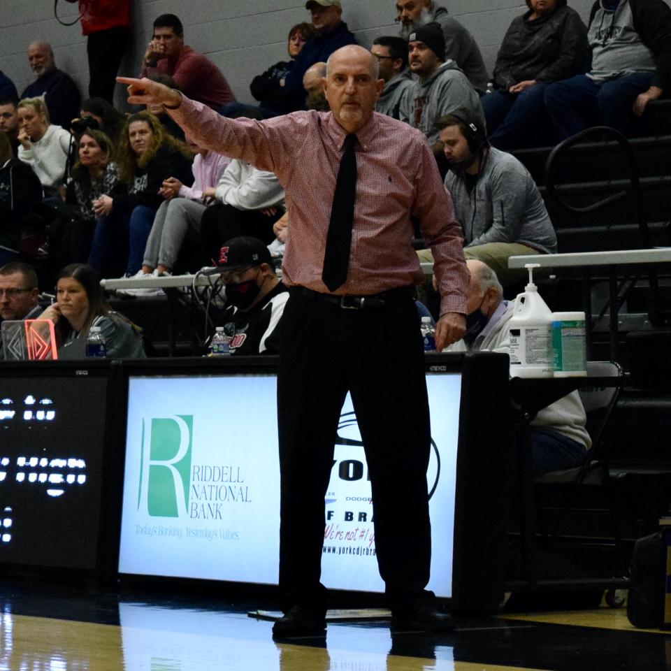 Edgewood head girls basketball coach Gary Sims instructs his team from the sidelines during the Mustangs' 46-44 sectional semifinals loss to Northview.