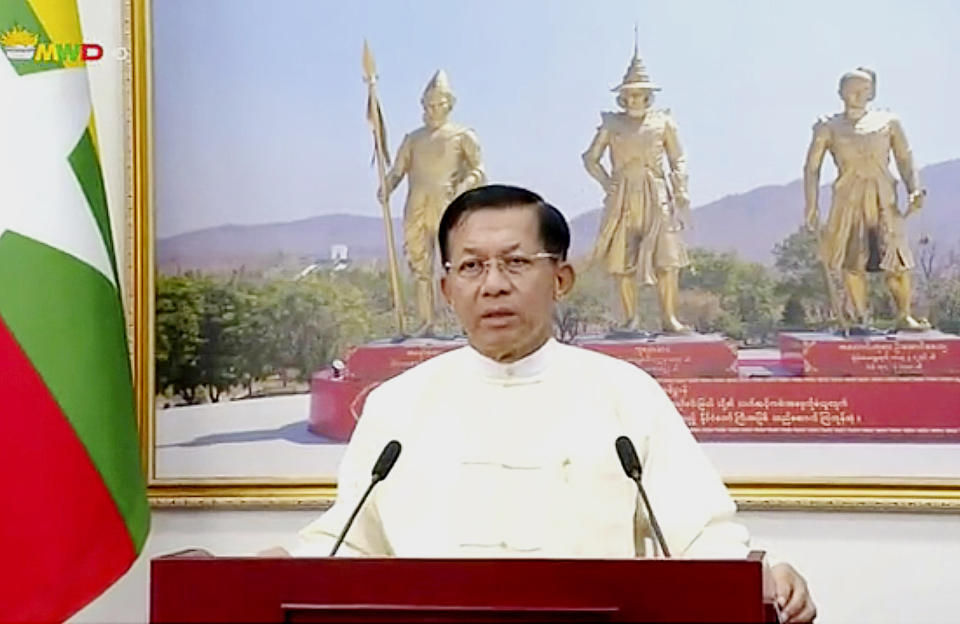 In this image from video broadcast April 18, 2021, over the Myawaddy TV channel, Senior General Min Aung Hlaing, chairman of the State Administrative Council, delivers his address to the public during Myanmar New Year. Leaders of the 10-member Association of Southeast Asian Nations meet Saturday, April 24, in Jakarta to consider plans to promote a peaceful resolution of the conflict that has wracked Myanmar since its military launched a deadly crackdown on opponents to its seizure of power in February. (Myawaddy TV via AP)